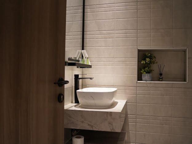 Апартаменты Lavenue Resthouse Назва Номер фото