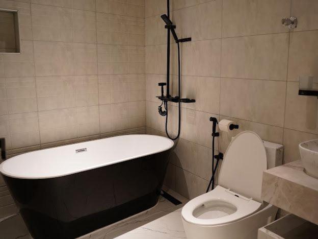 Апартаменты Lavenue Resthouse Назва Номер фото
