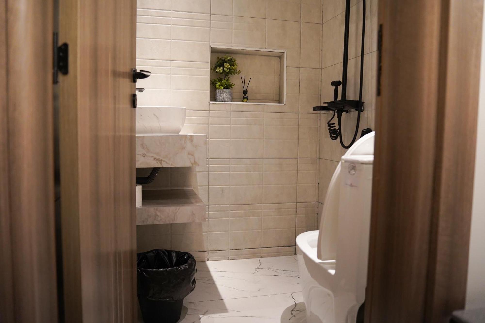 Апартаменты Lavenue Resthouse Назва Номер фото